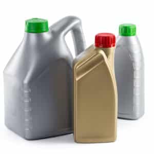 Plastic bottles from automobile oils isolated on a white background